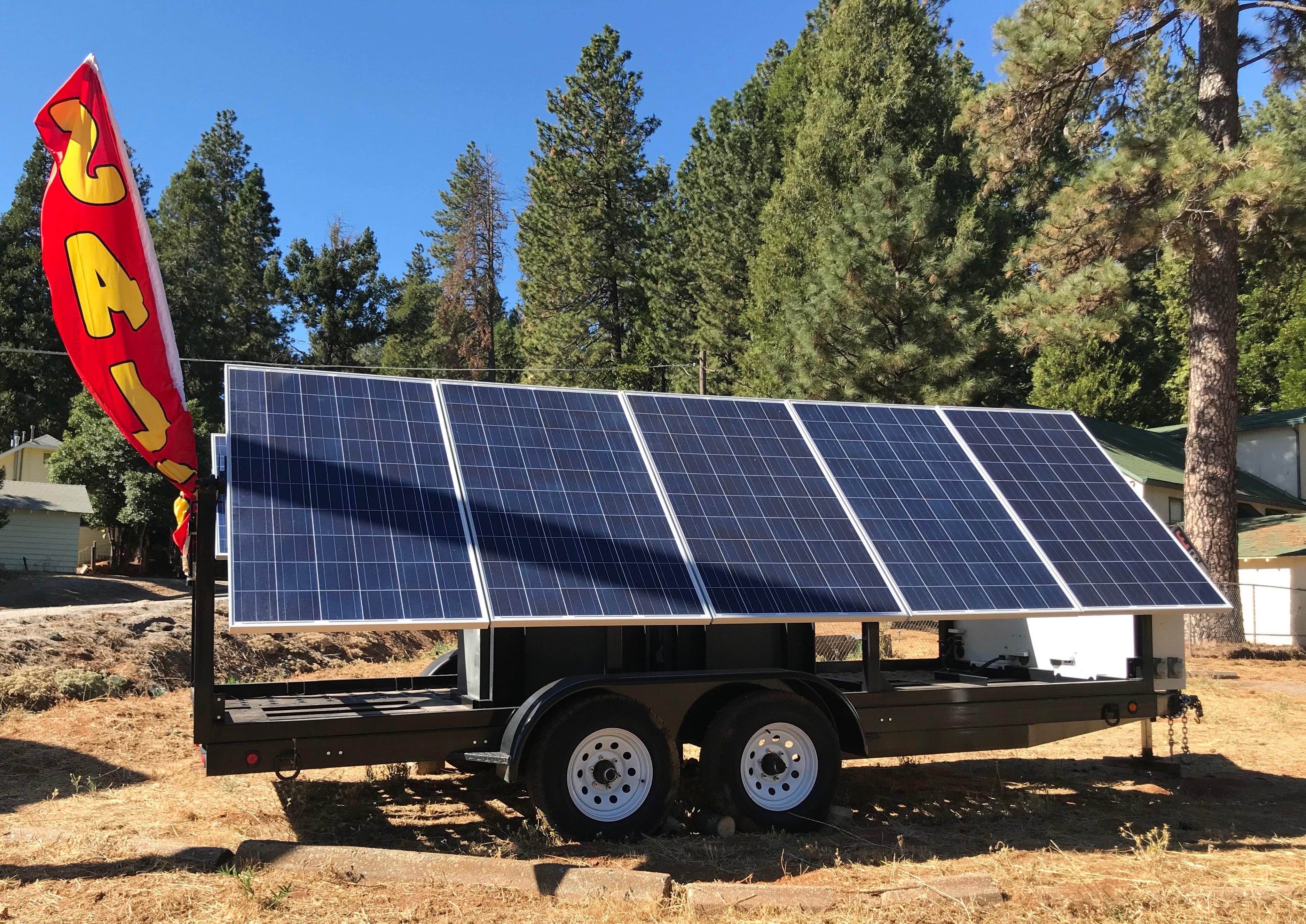 Mobile Solar Power Wagon with no lights setup in rural neighborhood